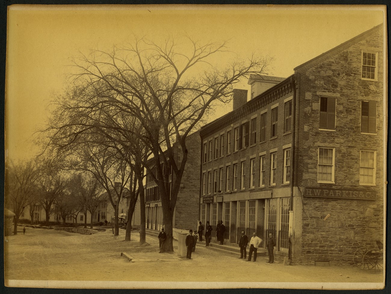 Commercial Block, Slatersville, two brick buildings on the right of street