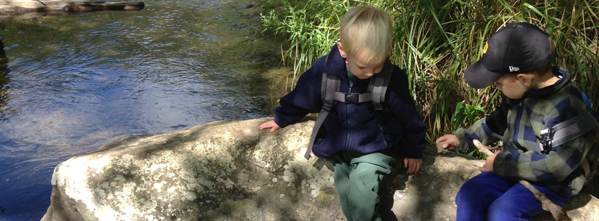 two boys by the water
