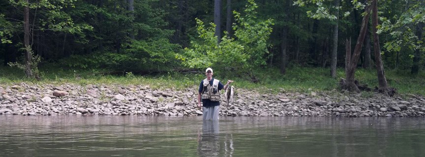 fisherman holding fish fisherman holding fish