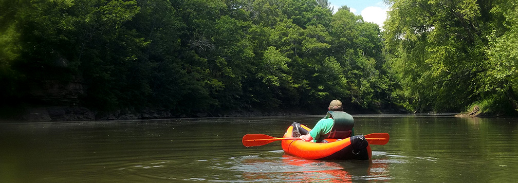 kayaker on a calm river