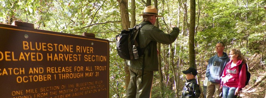 ranger talking to visitors ranger talking to visitors