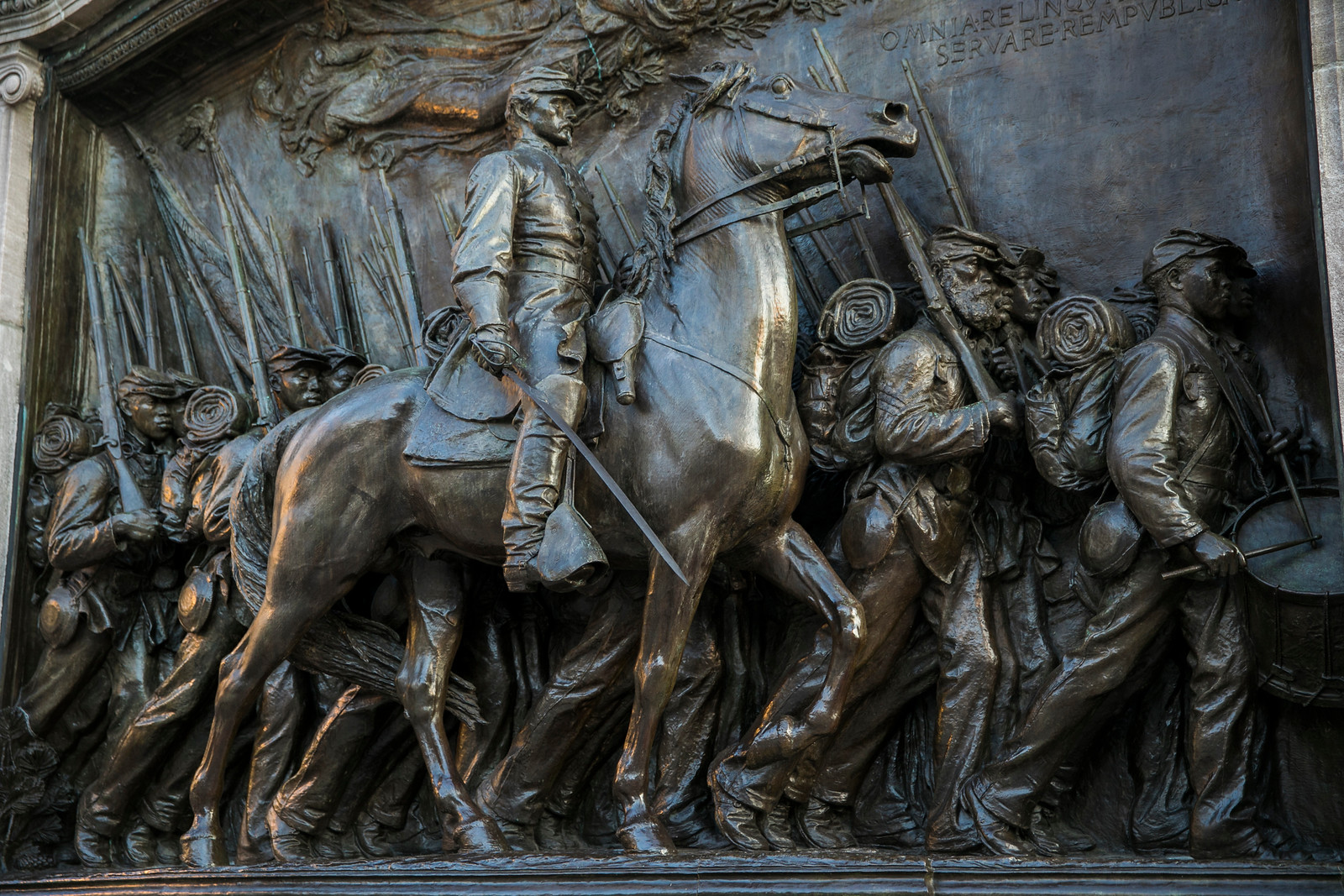 Teuten-Shaw-closeup close up of Shaw 54th memorial on RGS on horseback and soldiers marching
