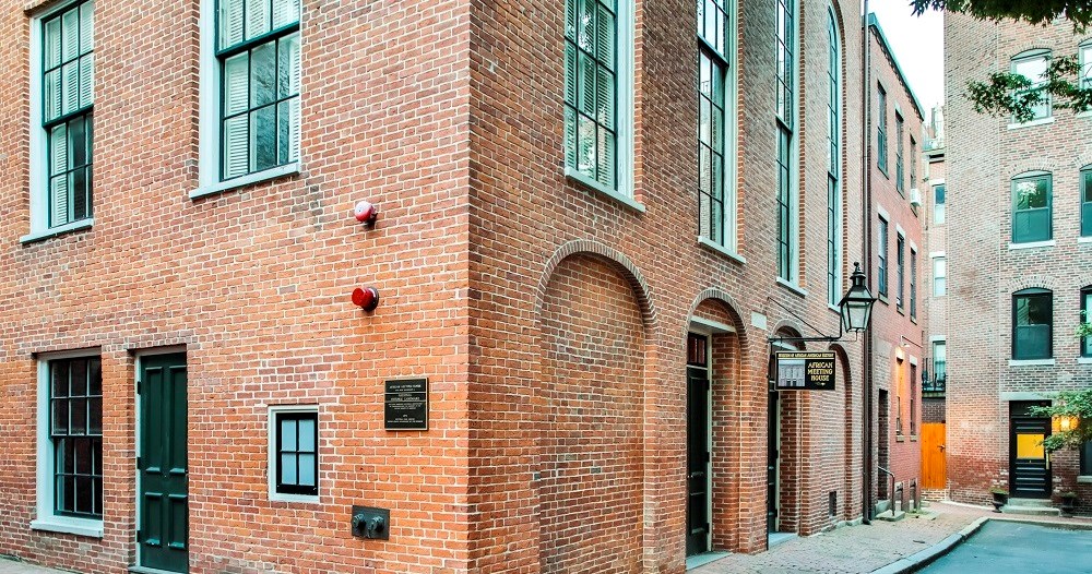 The African Meeting House, a 3-story red brick building.