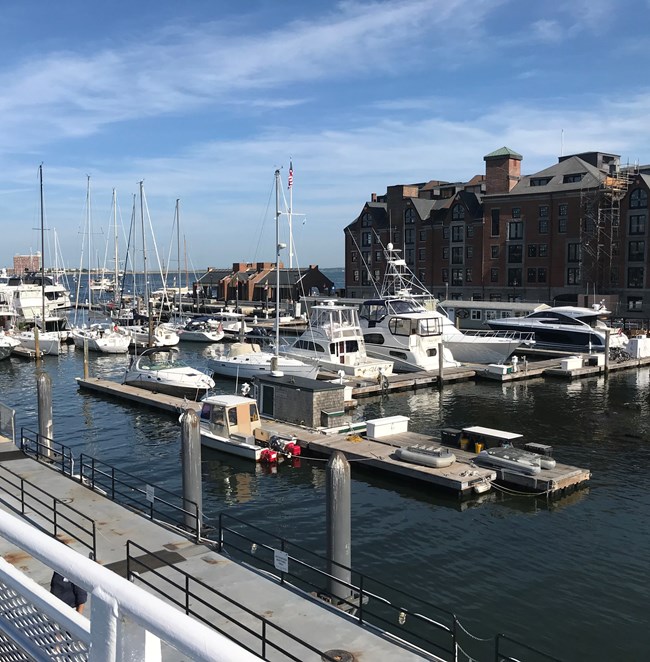 Long Wharf and Long Wharf North taken from atop of a boat.