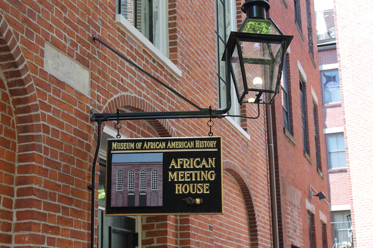 Close-up of sign for a brick building - the Museum of African American History.