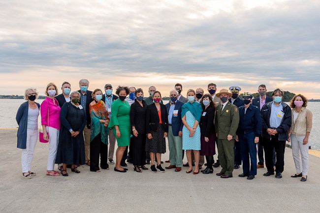 Members of the BHI Partnership group picture with Sec. Haaland