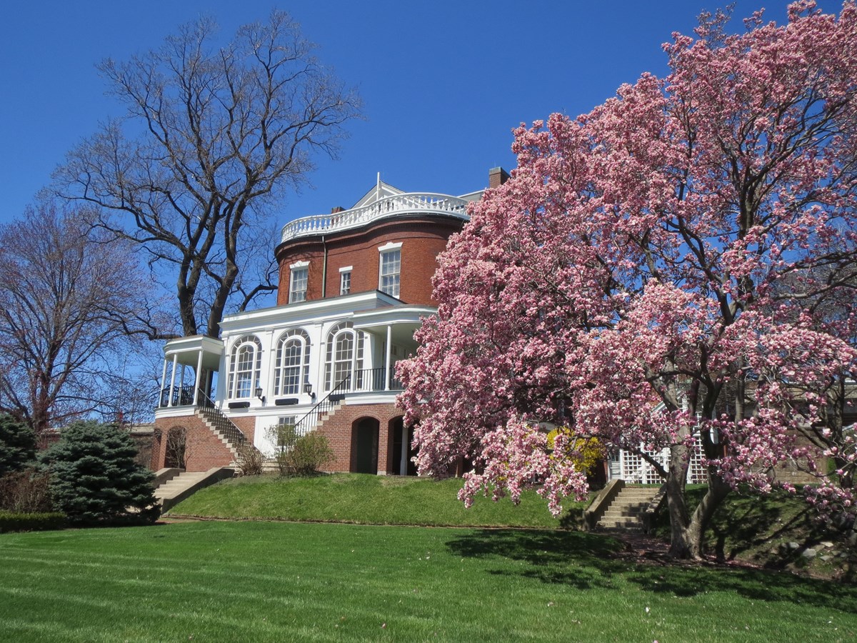 An image of the Commandant's House, a historic property at the Charlestown Navy Yard.