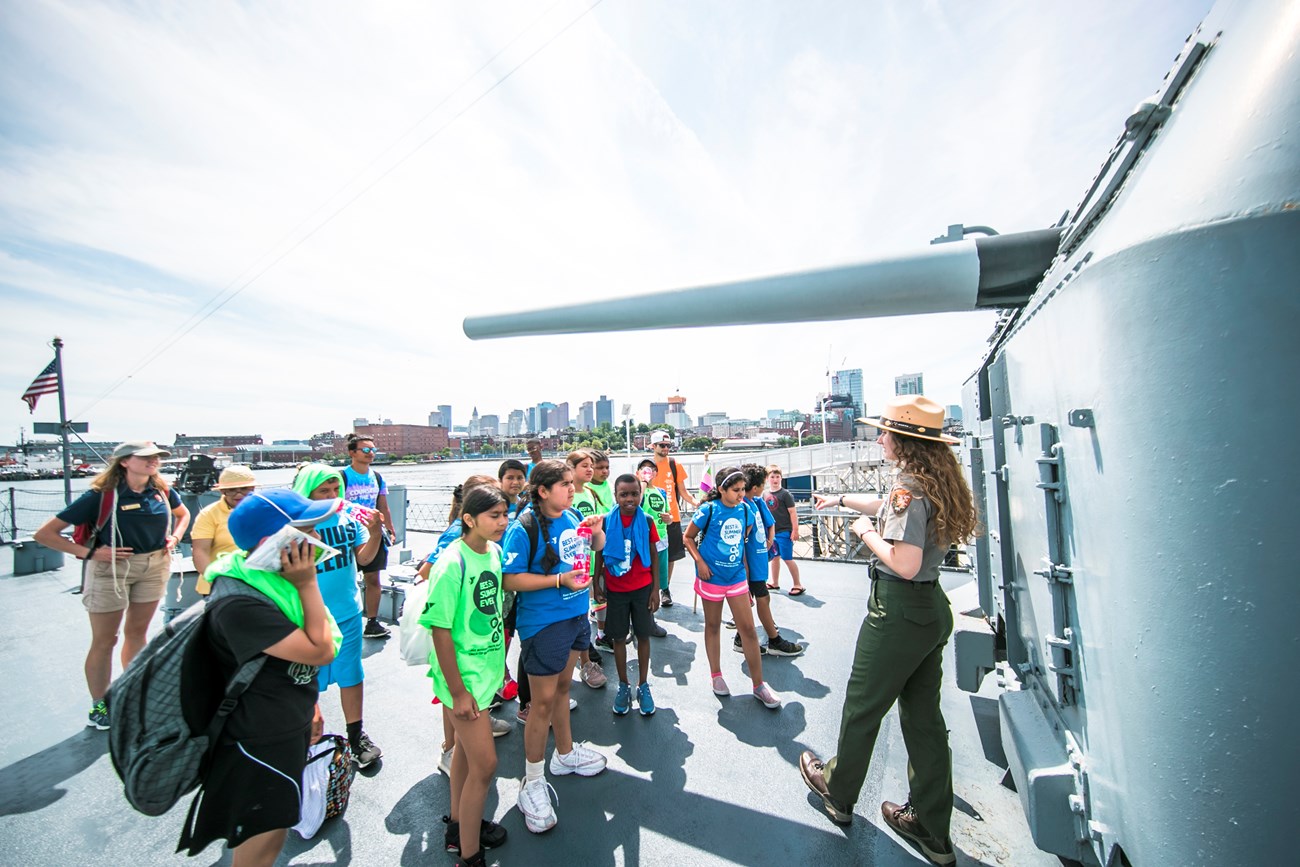 group of students with a park ranger on USSCY