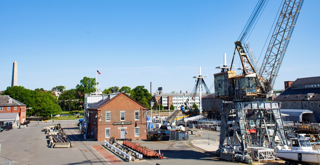 View of a crane and Building 10 at the Charlestown Navy Yard