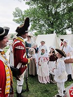 Members of the 10th Regiment of Foot talking to visitors Members of the 10th Regiment of Foot talking to visitors