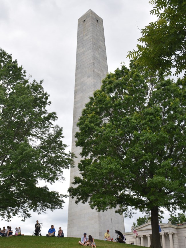 Bunker Hill Monument is a 221-foot granite obelisk. It stands atop today's Breed's Hill inside a small memorial park.