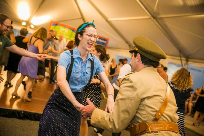 Swing Dancer couple in in 1940s clothing.