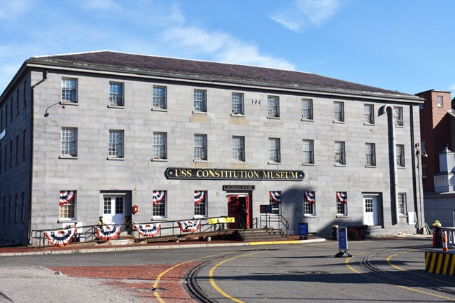 The USS Constitution Museum is housed in a historic granite Navy Yard building. The building houses two floors of interactive and accessible exhibits.