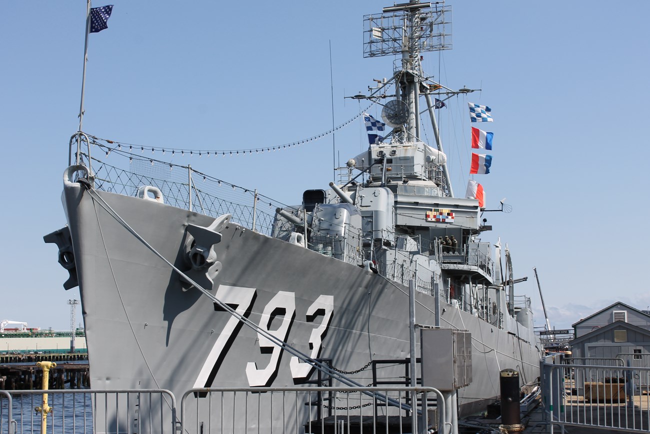 USS CASSIN YOUNG decorated with signal flags.