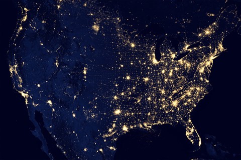 Satellite photo of North America at night illuminated by city lights