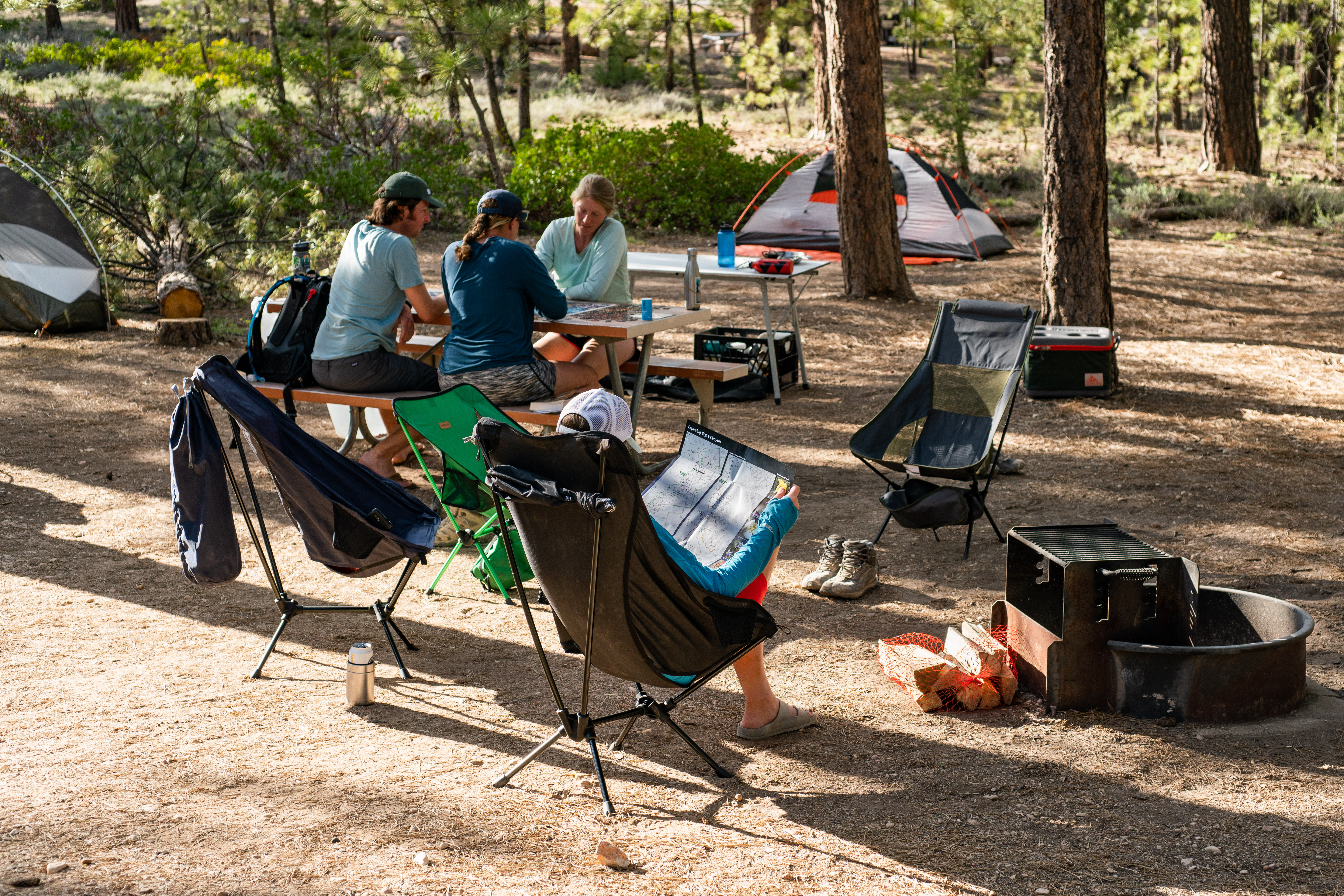 Sunset campground campers-09265 A group of campers relax in a campsite