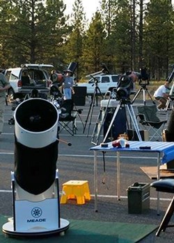 Assorted telescopes are set up for stargazing at the 2015 Astrofest