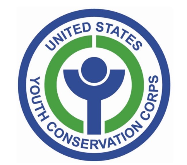 Blue, green and white circular logo that reads "United States Youth Conversation Corps"