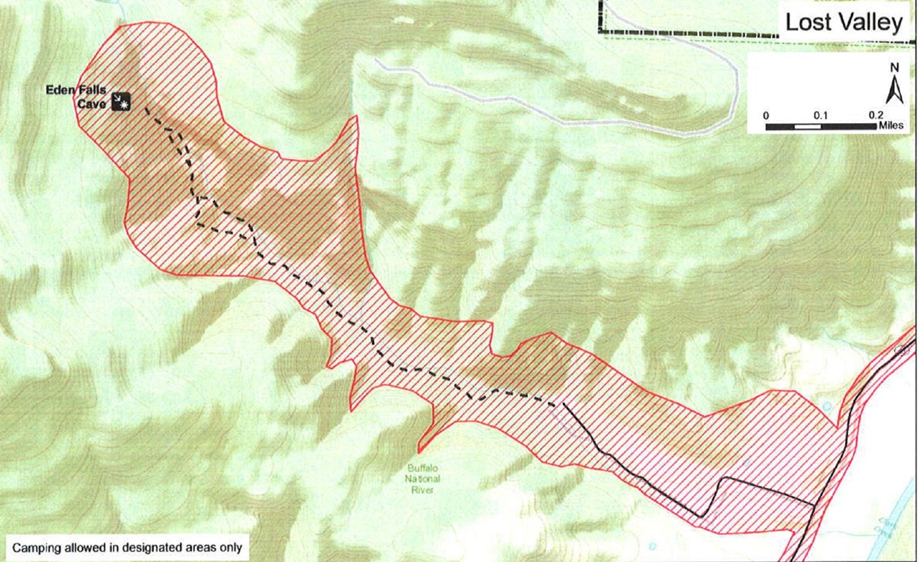 topographic map showing safety zone no hunting area in shaded red, roads are solid black lines, trails dashed black lines, mileage and compass direction at top right