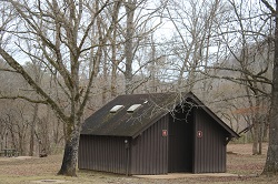restroom color photo of brown wooden building