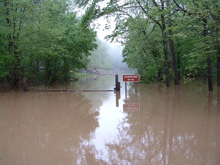 flood waters cover campground gate