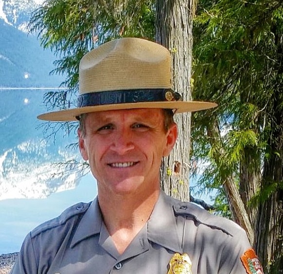 Portrait of Superintendent Mark Foust outdoors in a National Park Service uniform.