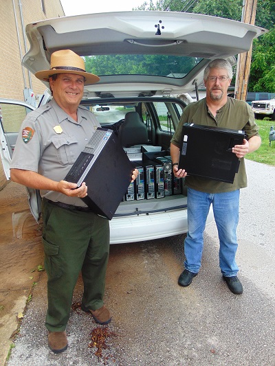 Park Ranger helps deliver used computers to local school