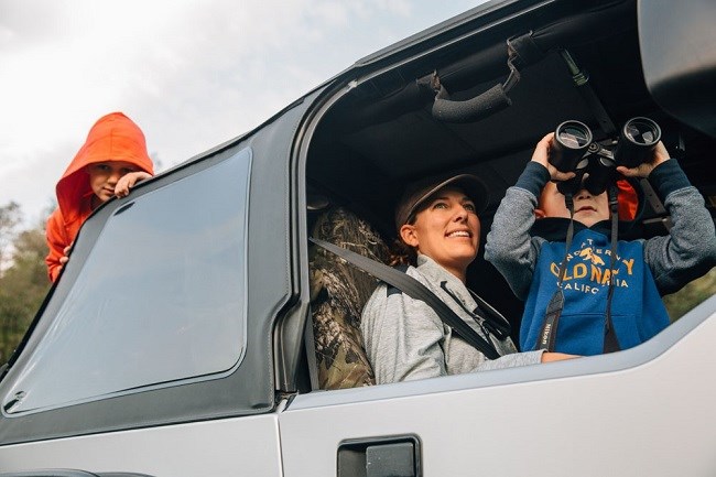elk viewing family 102017 photo of people in car with binoculars