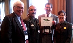 Arkansas tourism officials with park superintendent and deputy superintendent