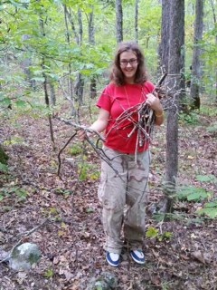 photo of Cindy Hawse, age 16, described as being 5’6” tall with a medium build, long brown hair, wearing glasses