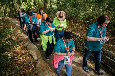 Special Olympians look for items for scavenger hunt