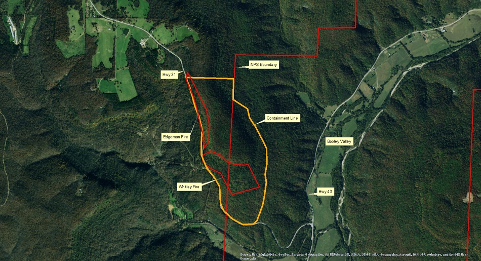 satellite map with fire and park boundaries marked with red lines, roads are yellow lines