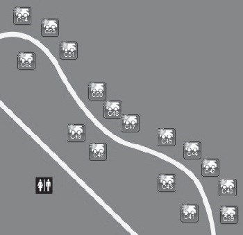 map of C loop of Buffalo Point Campground, white lines are roads, black square at bottom left is restroom symbol, symbols along road are campsite locations