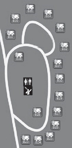 drawing of campsite locations for the B Loop at Buffalo Point, white lines are roads, symbols along road lines are site locations, symbol in center is restroom/shower house