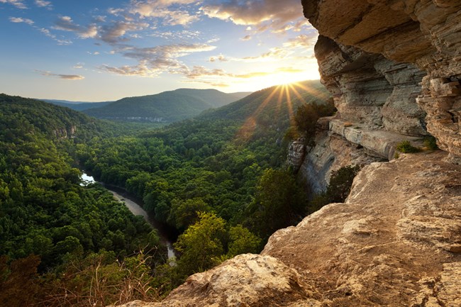 Panoramic view above the Ponca Wilderness from the edge of Big Bluff at sunset.