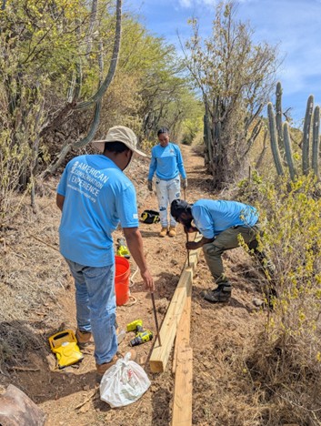 Youth working on trail imporvements