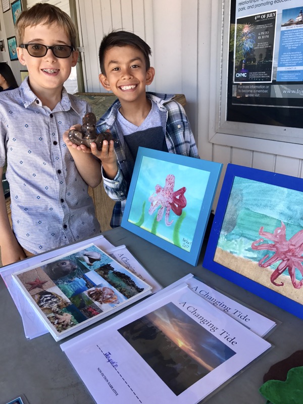 High Tech Elementary students showing their 3d tidepool critter models