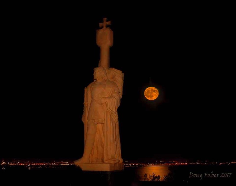The Harvest Moon illuminates the statue of Juan Rodriguez Cabrillo. Photo Credit: NPS/Doug Faber