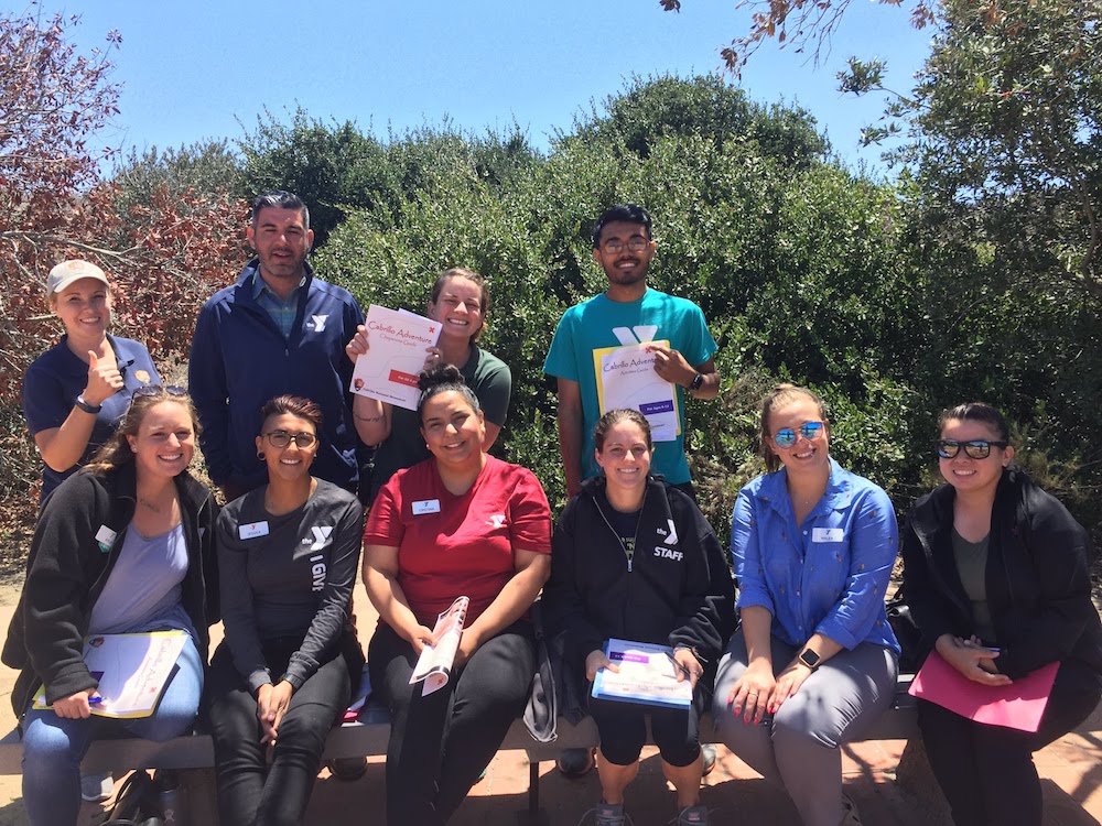 Park employees pose for a group photo with leaders from different YMCAs throughout San Diego County during a training at Cabrillo National Monument in May.