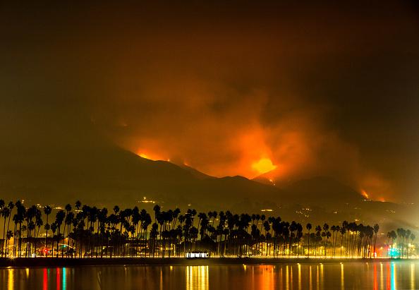 the western edge of the Thomas Fire as seen from the shores of Santa Barbara in December 2017. the western edge of the Thomas Fire as seen from the shores of Santa Barbara in December 2017.