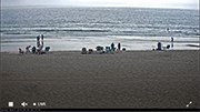grainy web cam image of the ocean