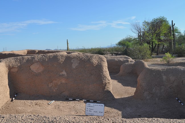 Photo of conservation work happening on the ruins walls.