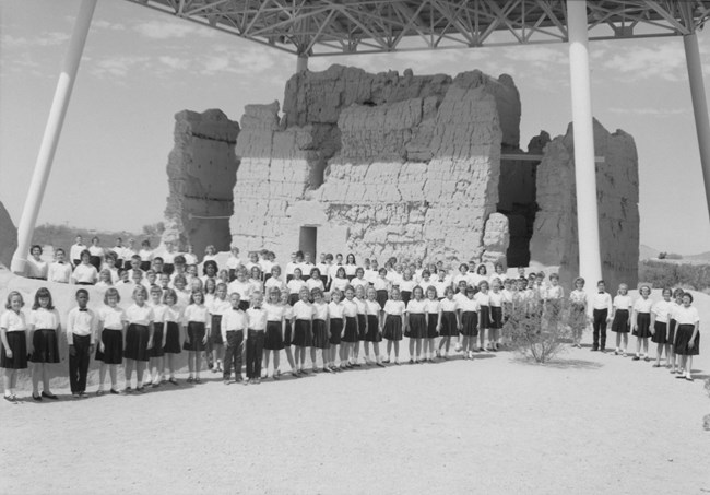 black and white picture of row after row of children