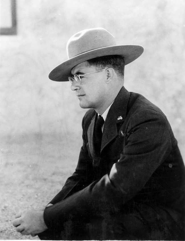 black and white photographs of Park Archeologist Charlie Steen in his dress uniform with ranger hat