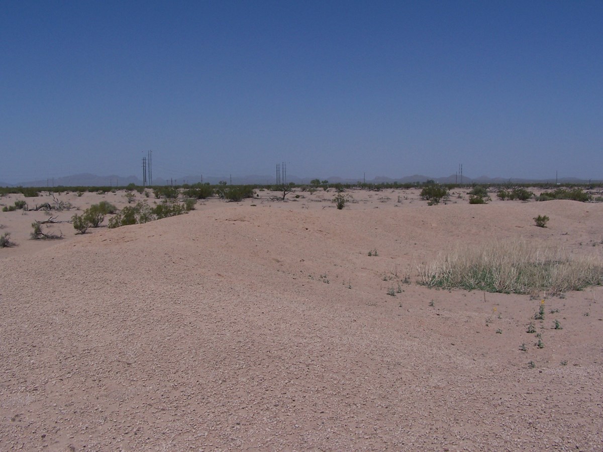 The desert seems featureless and empty