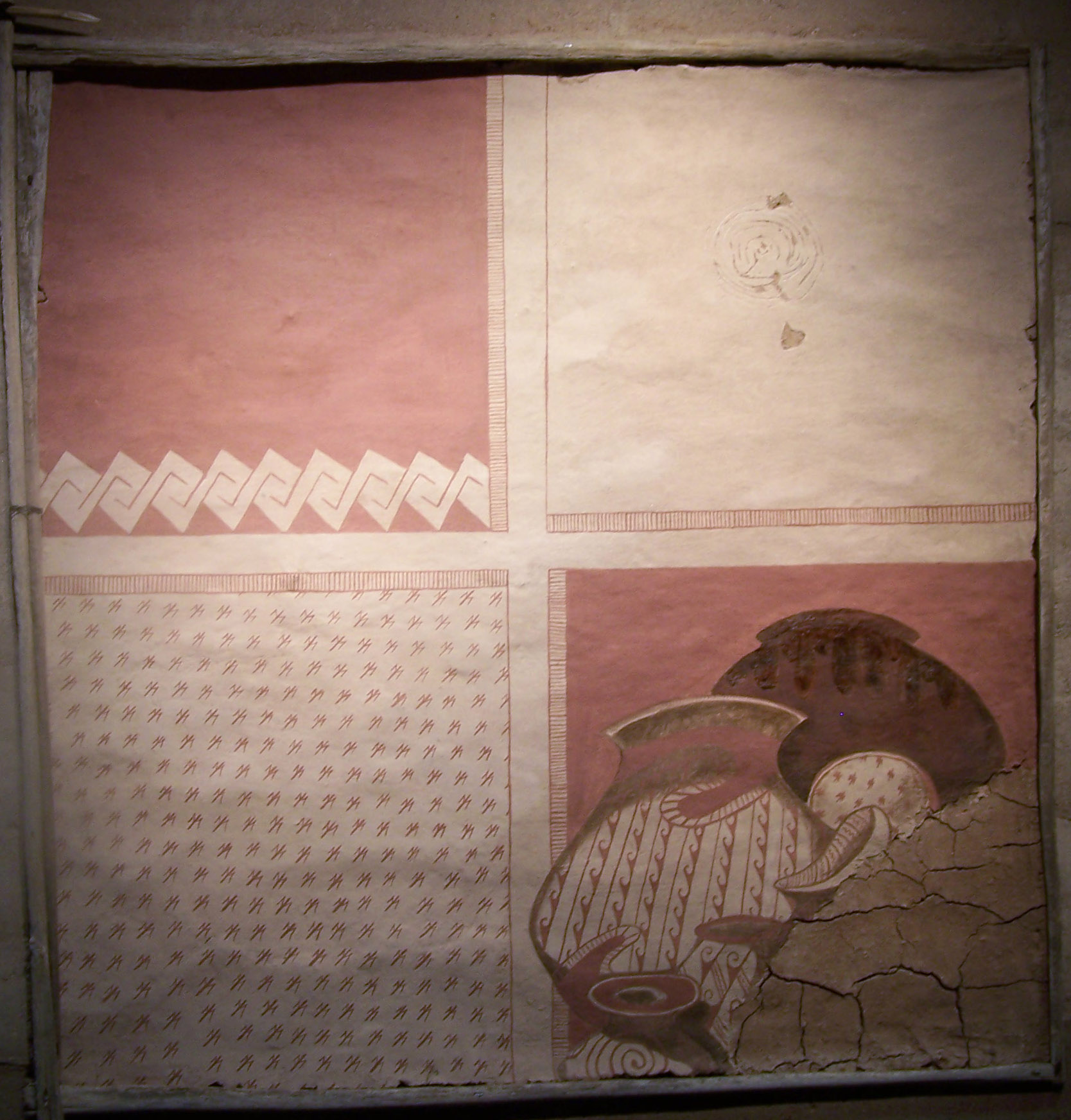 in the theater flat wall art in shades of red and buff reminds of the historic pottery and art of the ancient Sonoran Desert people