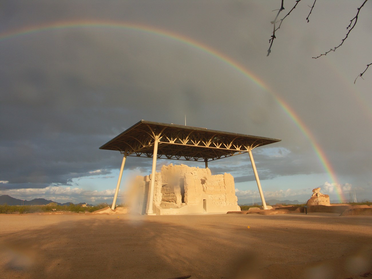 clearing skies reveal and double rainbow over the Casa Grande Great House