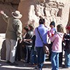 volunteer leads kids on a special tour of the ruins near the Great House