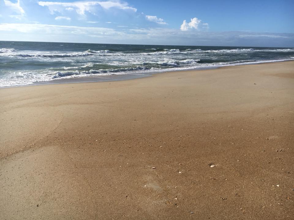 View of the Atlantic Ocean and a clean beach at Cape Hatteras National Seashore.