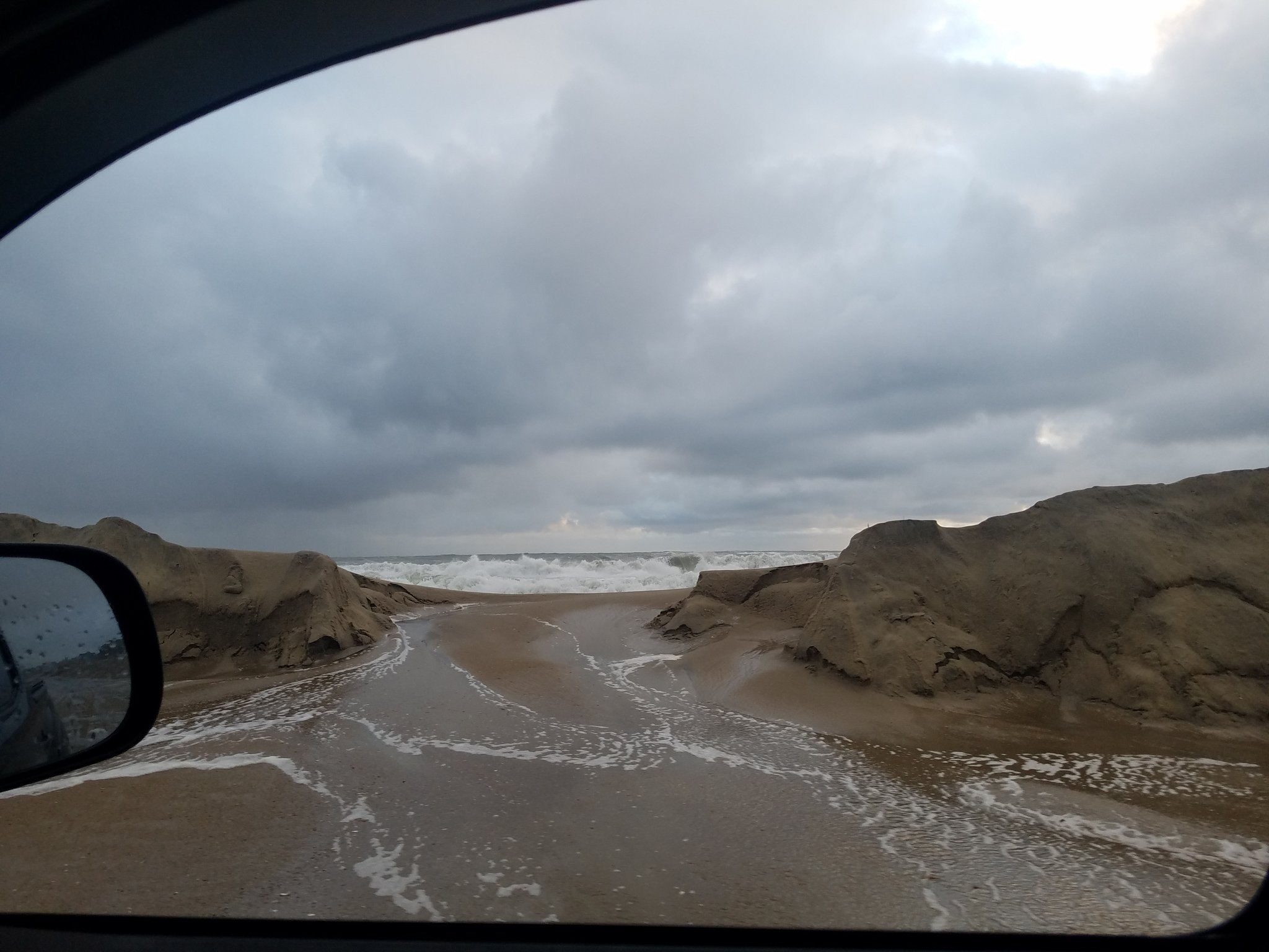 Photo of dune breach north of Rodanthe, NC. Photo of dune breach north of Rodanthe, NC.